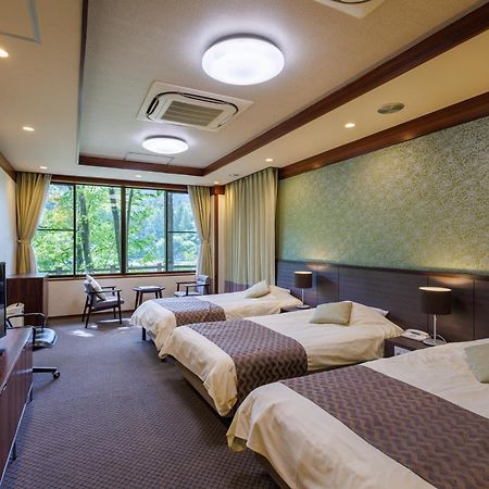 Okutamaji Hotel Ome Екстериор снимка